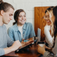 group of people chatting together at a table