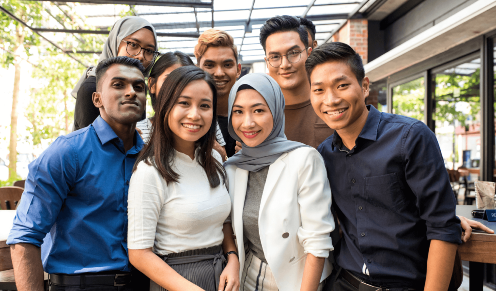 a group of colleagues smiling 