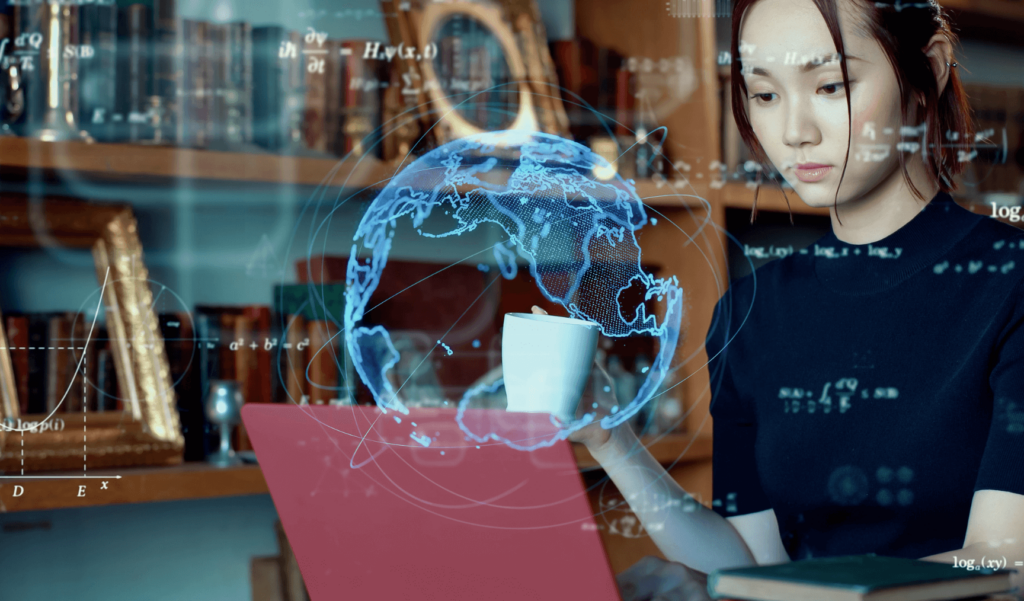 a woman working on her laptop with a translucent blue overlay of the globe