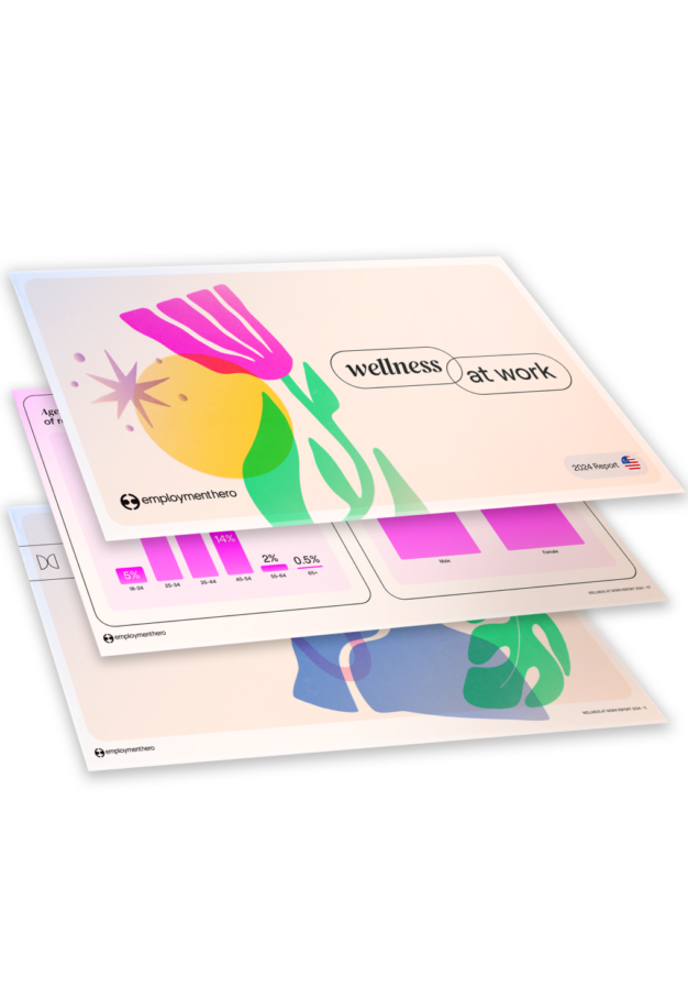 Stack of pages showcasing the 'Wellness at Work' report with colorful illustrations and graphs on different pages